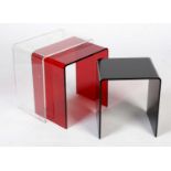 A contemporary nest of perspex occasional tables