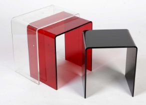 A contemporary nest of perspex occasional tables