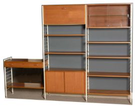 Attributed to Staples Ladderax: a mid-Century three bay wall unit.