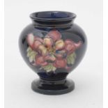 Moorcroft Columbine vase, boxed