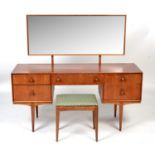 A mid Century teak dressing table with stool