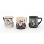 Three Moorcroft mugs