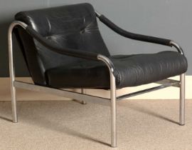 A mid 20th Century open arm chair.