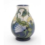 Moorcroft Rough Hawksbeard pattern vase.