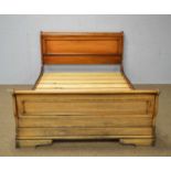 Willis & Gambier: a Louis Philippe-style cherrywood sleigh bed.