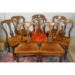 A set of Victorian mahogany balloon back dining chairs.