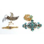 Four Victorian and later brooches.