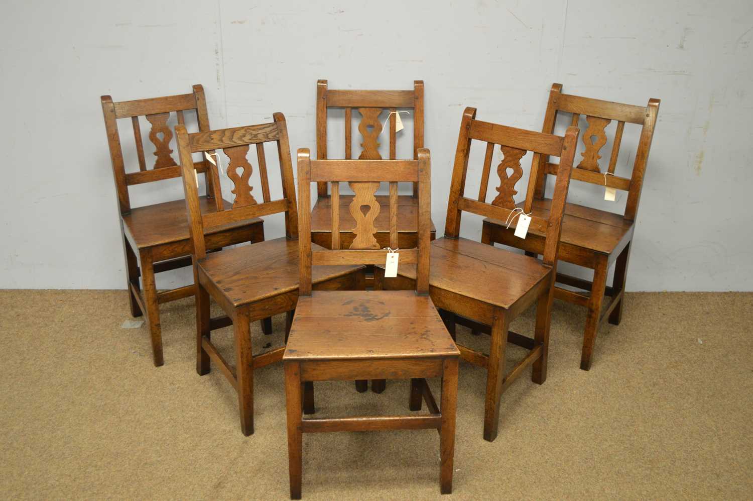 A set of six 19th Century oak Provincial rustic dining chairs.