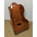 A Georgian mahogany child's rocking commode.