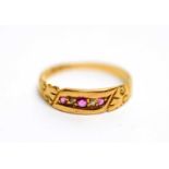 A ruby and diamond 18ct yellow gold ring,