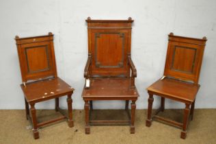 Three early 20th Century mahogany hall chairs.