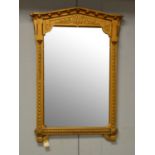A 19th Century oak painted mirror.