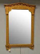 A 19th Century oak painted mirror.