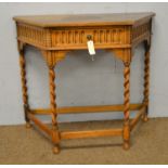 A mid 20th C oak side table.