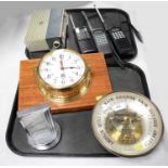 A selection of vintage clocks, scientific instruments, and accessories.