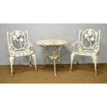 A white painted garden table and two chairs.