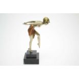 An Art Deco cast metal figure of a lady after Ferdinand Preiss.