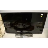Toshiba flat screen LCD colour TV, 32in., with remote control