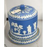 A blue Jasperware cheese dome and stand.