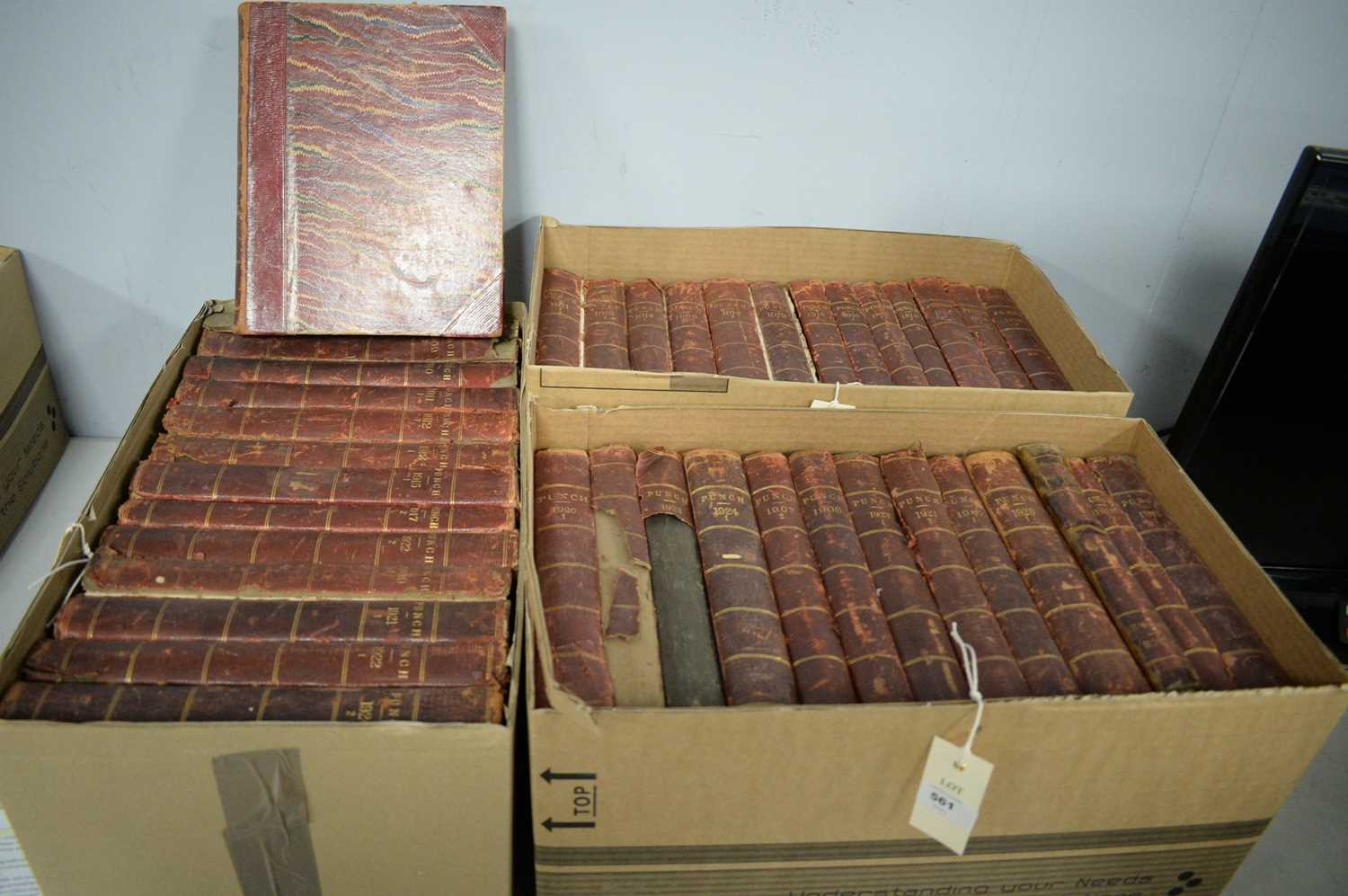 A selection of volumes of Punch magazines.