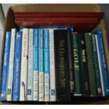A collection of golf yearbooks and other golf books.
