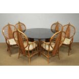 An Asian bamboo garden/conservatory table and six chairs