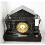 A Victorian slate mantel clock,