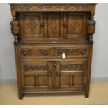 A 20th Century oak court cupboard.