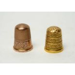 Two 9ct gold thimbles.