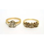 Two gold rings set with paste stones,
