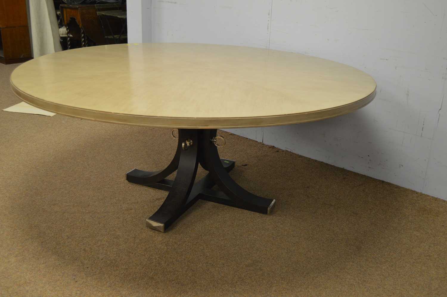 A large painted wood circular dining table. - Image 2 of 5