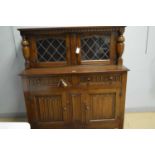 An early 20th Century oak sideboard.