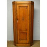 An oak corner wardrobe