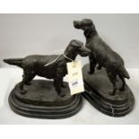 A pair of bronze figures of dogs after Christophe Fratin.