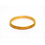 A 22ct gold wedding band,