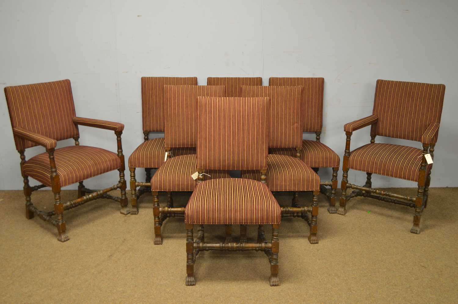 A set of eight 20th Century Carolean-style oak dining chairs.