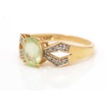A peridot and diamond ring, and a green apatite and diamond ring,