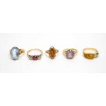 An amber and diamond dress ring, and four others