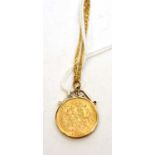 A George V gold half-sovereign pendant