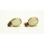 A pair of opal and ruby pendant earrings,