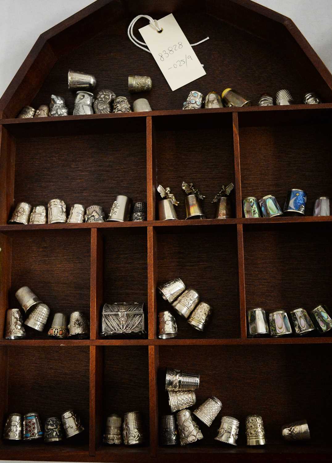 A selection of silver and other thimbles.