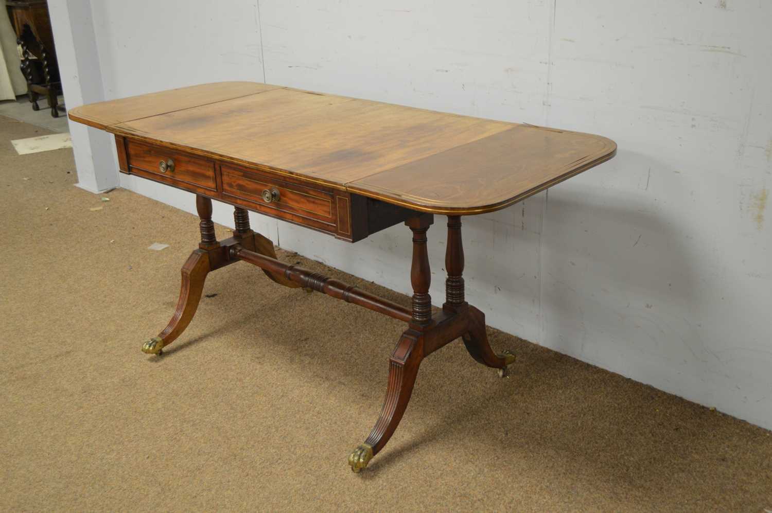 A Regency mahogany and brass inlaid sofa table. - Image 3 of 6