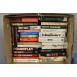 A selection of hardback and paperback books,