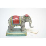 A Halcyon Days ceramic elephant figure.