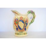 A Crown Devon Fieldings musical Coronation jug.