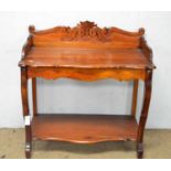 A Victorian style carved mahogany wash stand