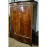 An Early 20th century mahogany two door wardrobe