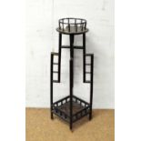 An aesthetic movement Japanese style ebonised jardinere stand