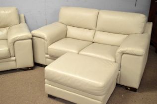 A modern leather three piece suite