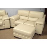 A modern leather three piece suite